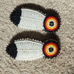 Two beautiful hand-beaded feather barrettes